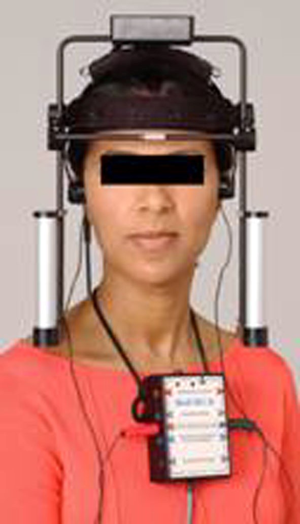 Photo of patient using JT-3D Jaw Tracker with EMG to monitor a bite registration